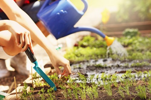 Team member preparing tools for garden maintenance