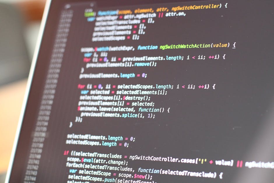 A close-up view of a computer screen displaying lines of colorful code in a text editor. The background shows a blurred section of the coding environment, with syntax highlighting in shades of blue, p